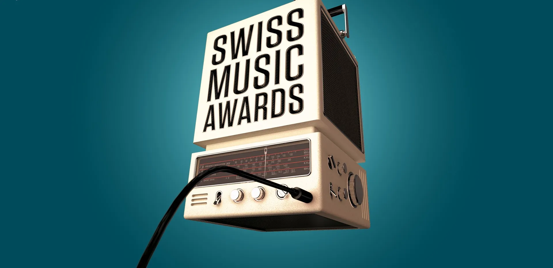 Ein altes Radio mit einem Schild „Swiss Music Awards“ auf türkisem Grund